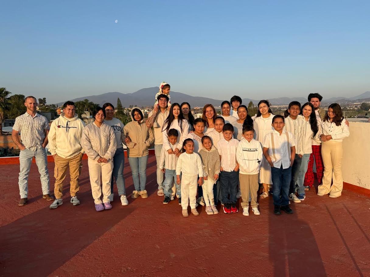 Smiling children together with caring staff at Bonds of Love Orphanage